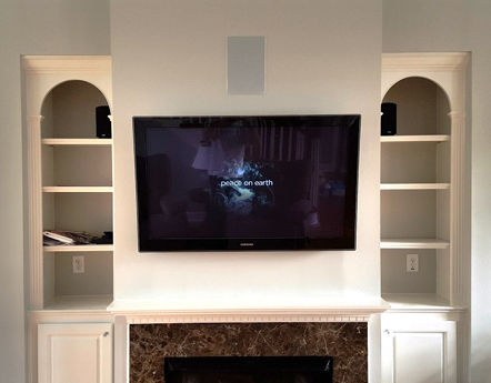 Wired Installations concealed wiring for 5 speakers with 2 bookshelf speakers to complete a 7.1 surround sound. Mounted an LED above fireplace and programmed RF universal remote to operate system<br>

Brands: Samsung, Yamaha, Definitive Technology, Logitech Harmony, Binary, Episode, Sanus